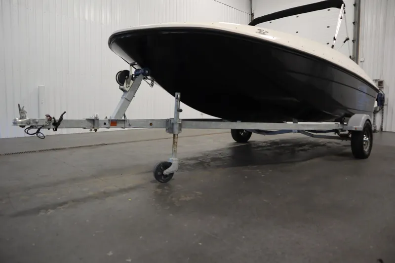 Slide: The Image of 2021 Bayliner 16 Element boat on trailer in indoor storage facility. - 36