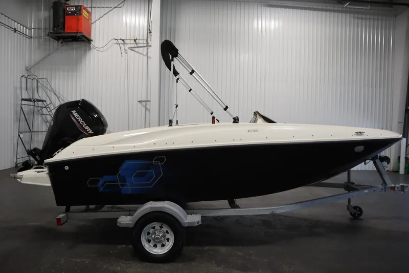 Slide: The Image of 2021 Bayliner 16 Element boat on trailer in indoor storage facility. - 4