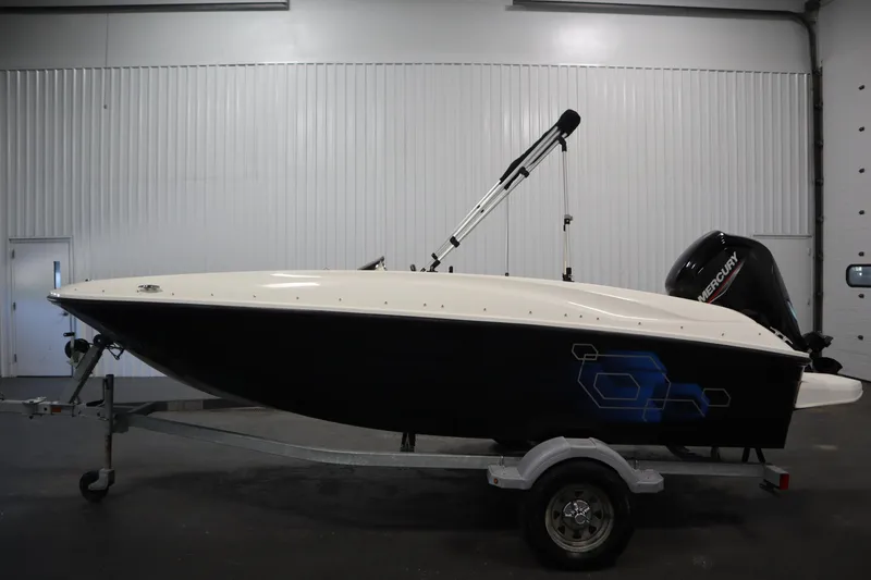 Slide: The Image of 2021 Bayliner 16 Element boat on trailer in indoor storage. - 8