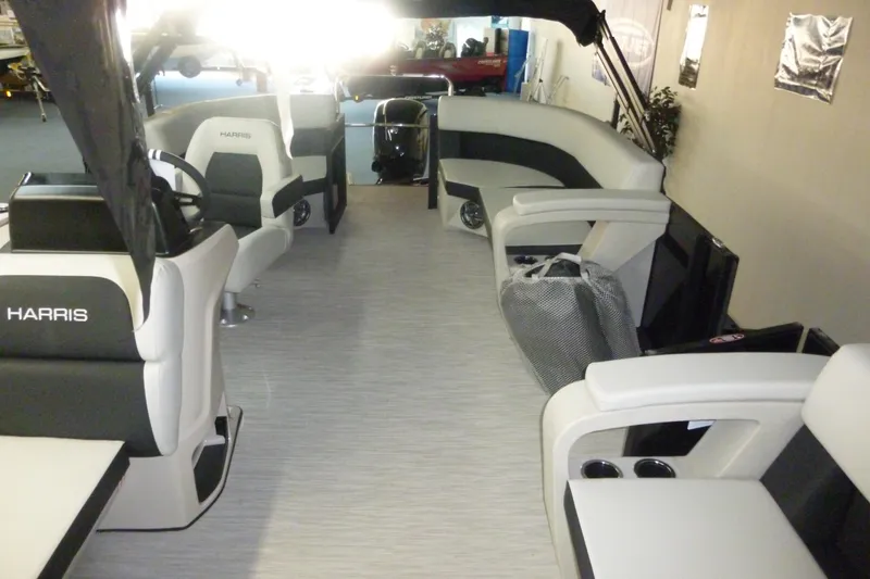 Slide: The Image of Interior of 2025 Harris Breese 210 boat with modern seating and sleek design. - 6