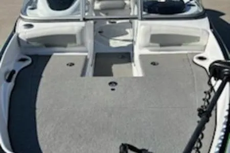 Slide: The Image of 2020 Nitro Z19 Sport boat interior with steering console and seating arrangement. - 6
