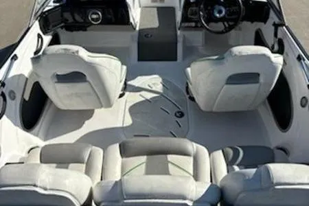 Slide: The Image of 2020 Nitro Z19 Sport boat interior with fishing equipment and controls. - 7