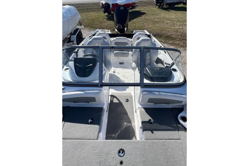 Slide: The Image of 2020 Nitro Z19 Sport boat interior with seating and steering wheel. - 9