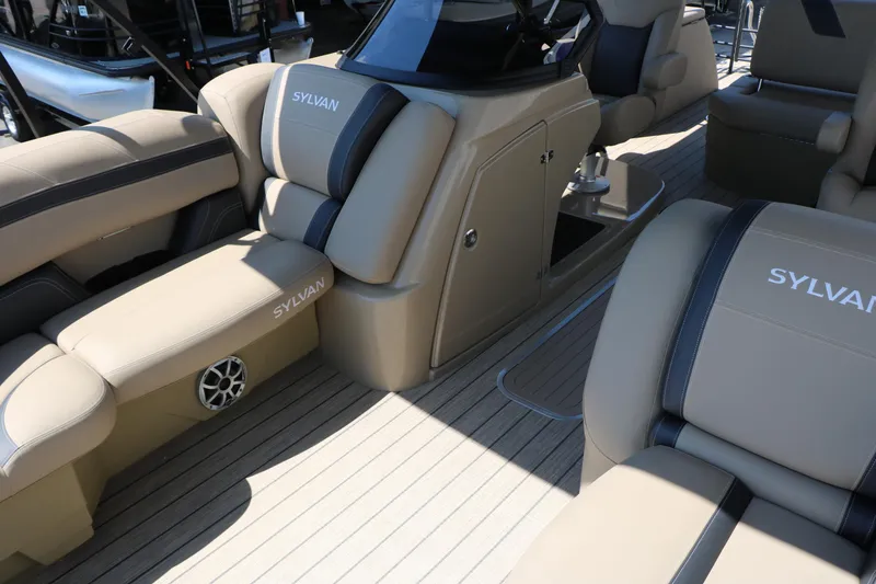 Slide: The Image of Luxurious interior of 2025 Sylvan L3 DLZ pontoon boat with plush seating. - 17