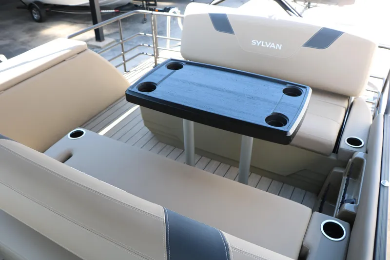 Slide: The Image of Interior of 2025 Sylvan L3 DLZ boat with seating and table. - 24
