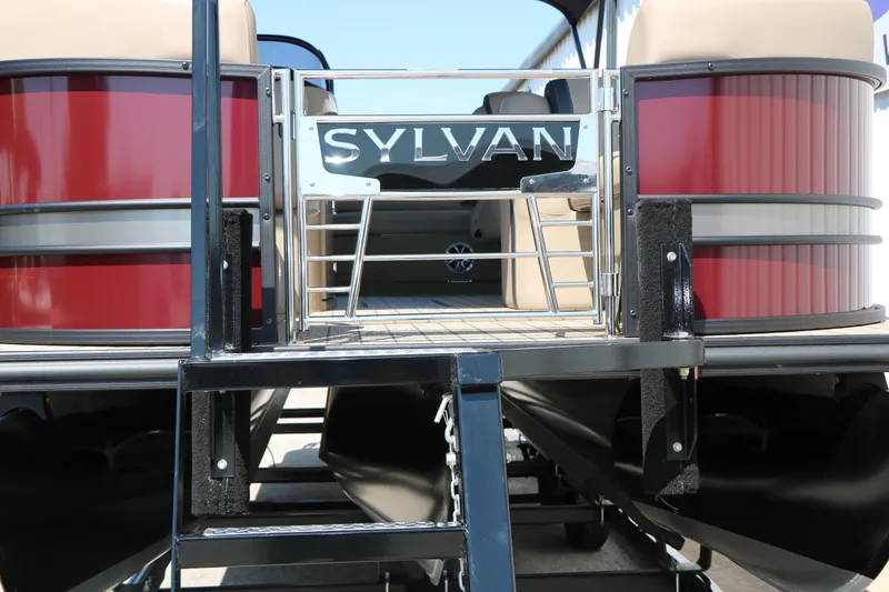Slide: The Image of 2025 Sylvan L3 DLZ pontoon boat with red exterior and sleek design. - 8