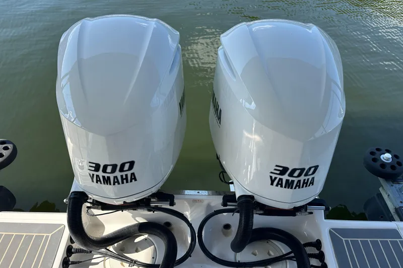Slide: The Image of Twin Yamaha 300 outboard engines on a 2020 Chaparral 300 OSX boat. - 13