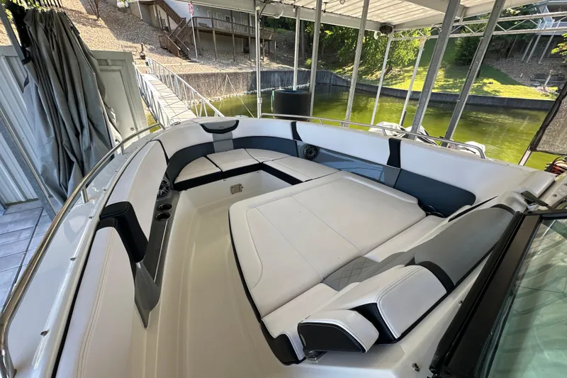 Slide: The Image of 2020 Chaparral 300 OSX boat interior with spacious seating and modern design. - 29