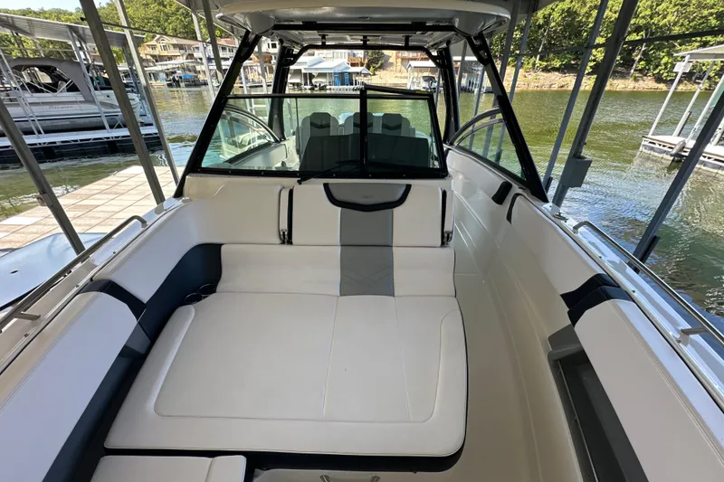 Slide: The Image of 2020 Chaparral 300 OSX boat interior with spacious seating and modern design. - 31