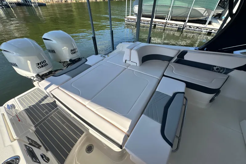Slide: The Image of 2020 Chaparral 300 OSX boat with Yamaha engines, featuring spacious seating and modern design. - 48