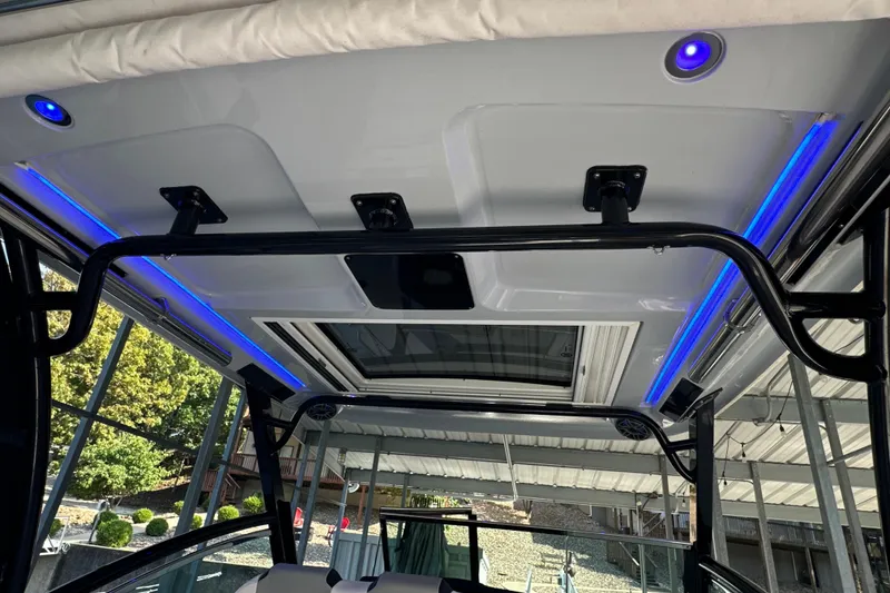 Slide: The Image of Interior view of 2020 Chaparral 300 OSX boat with blue LED lighting. - 63