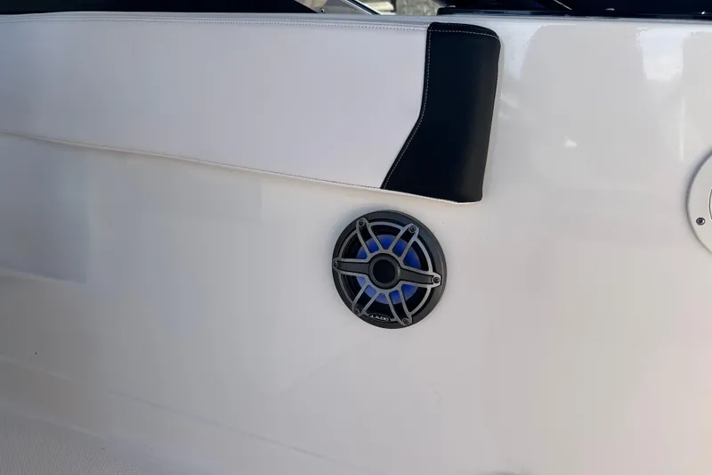 Slide: The Image of 2020 Chaparral 300 OSX boat interior with JL Audio speaker detail. - 66
