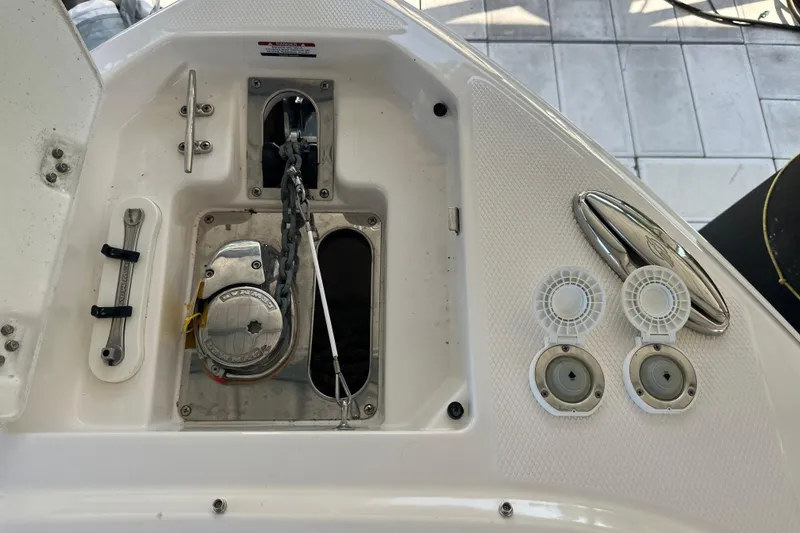 Slide: The Image of 2020 Chaparral 300 OSX boat anchor system with cleat and chain mechanism. - 71