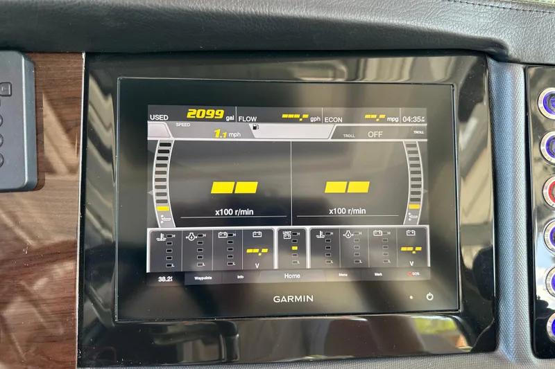 Slide: The Image of Garmin display on 2020 Chaparral 300 OSX showing speed and fuel data. - 76
