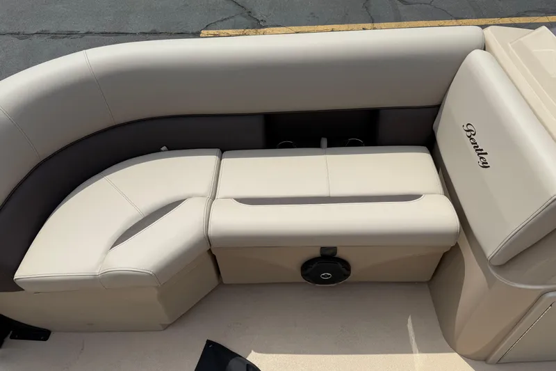 Slide: The Image of 2026 Bentley Pontoons Fish 220 Fish-N-Cruise, beige seating, luxurious design. - 18