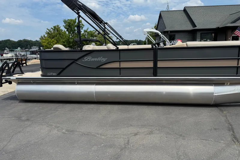 Slide: The Image of 2026 Bentley Pontoons Fish 220 Fish-N-Cruise pontoon boat on display outdoors. - 5