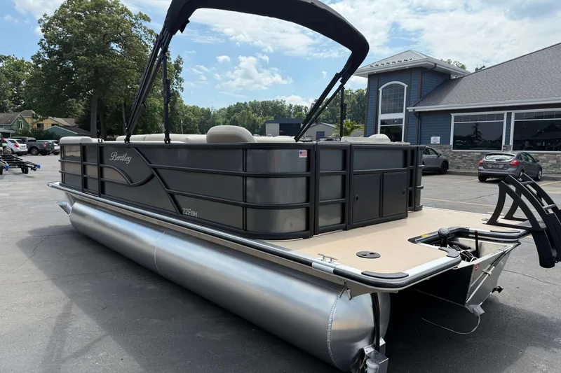 Slide: The Image of 2026 Bentley Pontoons Fish 220 Fish-N-Cruise pontoon boat in a parking lot. - 7
