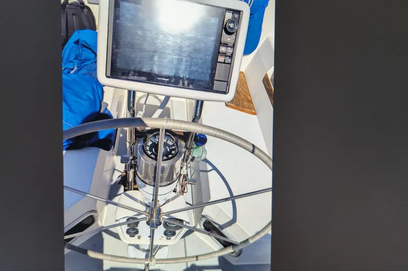 Slide: The Image of Steering wheel and navigation system on a 1990 Catalina 42 sailboat. - 10