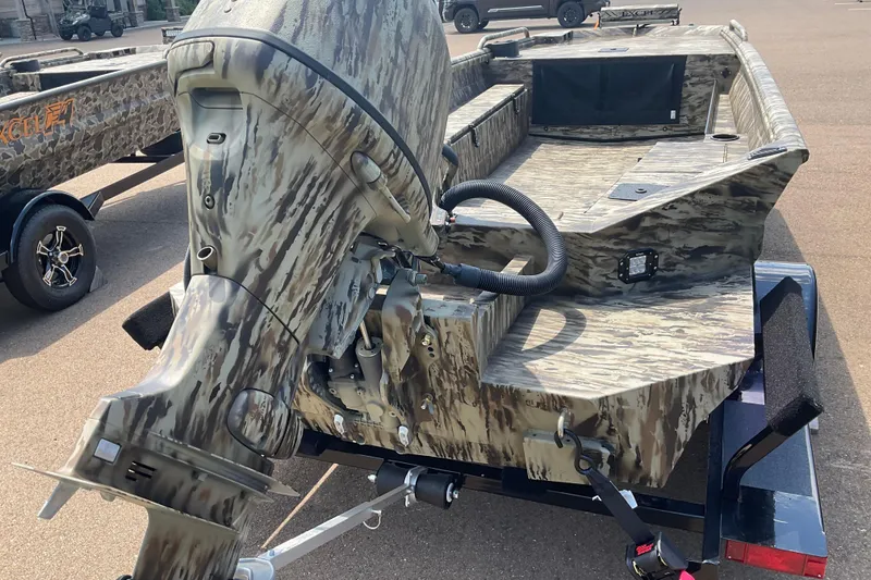 Slide: The Image of 2026 Excel 1751 Viper F4 boat with camouflage design on a trailer. - 6