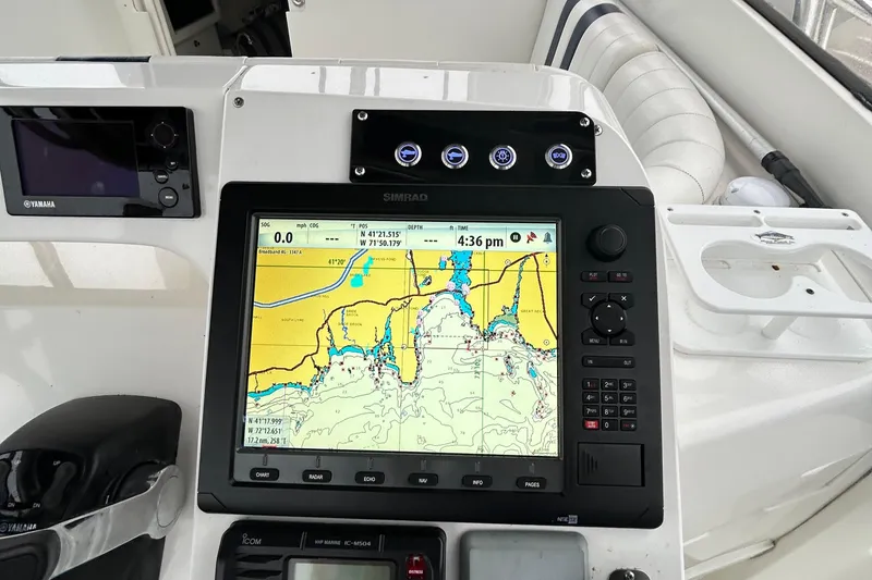 Slide: The Image of Navigation system on a 2003 Intrepid 310 Walkaround boat dashboard. - 8