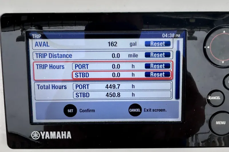 Slide: The Image of Yamaha display on 2003 Intrepid 310 Walkaround showing trip and total hours. - 9