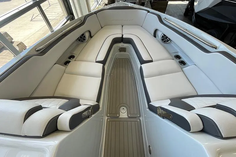 Slide: The Image of 2024 Crownline 290SS boat interior with luxurious seating and modern design. - 4