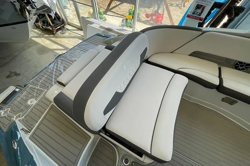Slide: The Image of 2024 Crownline 290SS boat interior with sleek seating and modern design. - 8