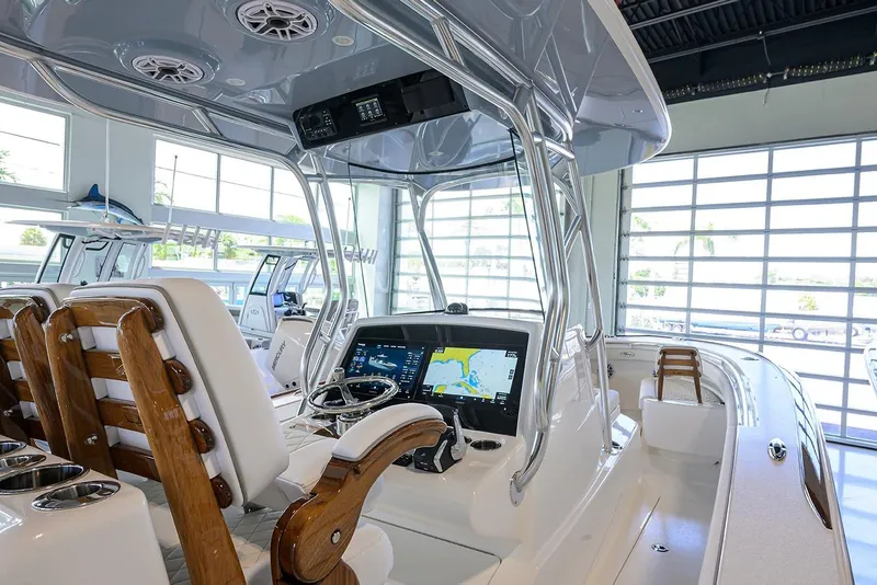 Slide: The Image of 2026 Valhalla V-29 boat interior with advanced navigation system and luxurious seating. - 19