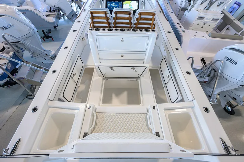 Slide: The Image of Valhalla V-29 2026 boat interior with Yamaha engines, featuring storage and seating. - 24
