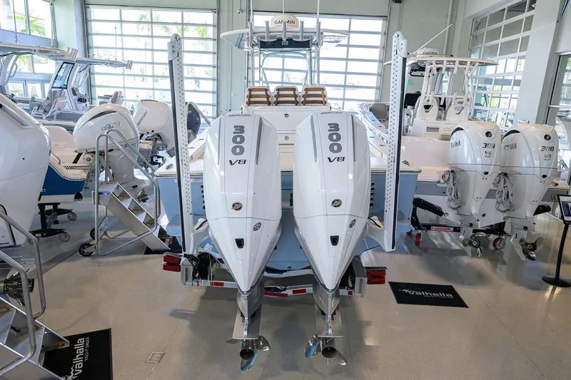 Slide: The Image of 2026 Valhalla V-29 boat with dual 300 V8 engines in showroom. - 29