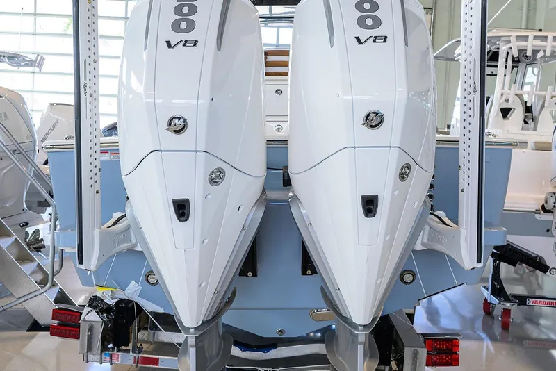Slide: The Image of 2026 Valhalla V-29 boat with dual 600 V8 engines in a showroom. - 30