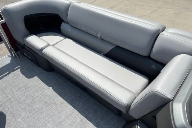 Slide: The Image of 2026 Sun Tracker SportFish 20 DLX boat interior with gray cushioned seating. - 10