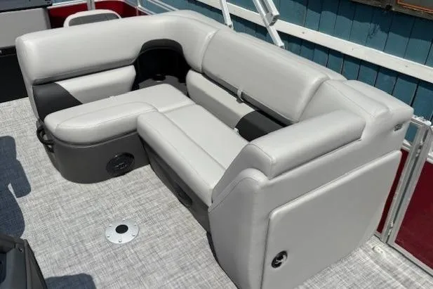 Slide: The Image of Luxurious seating on 2026 Sun Tracker SportFish 20 DLX pontoon boat, featuring sleek gray upholstery. - 15