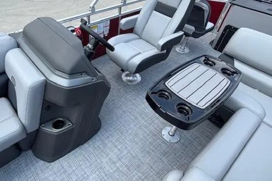 Slide: The Image of 2026 Sun Tracker SportFish 20 DLX interior with seating and table, showcasing modern design. - 20