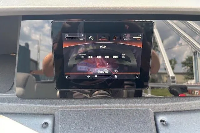 Slide: The Image of Dashboard display of 2026 Sun Tracker SportFish 20 DLX boat, showing audio controls. - 22