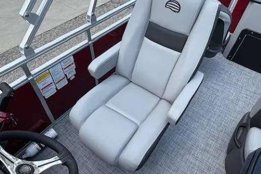 Slide: The Image of 2026 Sun Tracker SportFish 20 DLX boat seat with steering wheel, gray upholstery. - 24