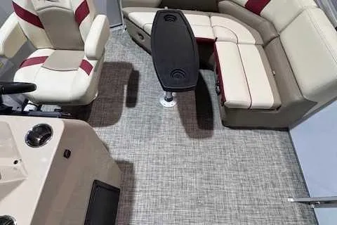 Slide: The Image of 2025 SunCatcher Select 16C boat interior with seating and table. - 6