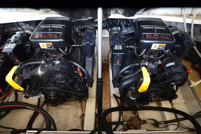Slide: The Image of Twin Volvo Penta 5.0GL engines in a 2000 Larson Cabrio 290 boat. - 21