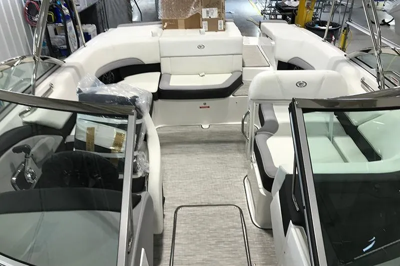 Slide: The Image of 2024 Cobalt 220S boat interior with sleek seating and modern design. - 5