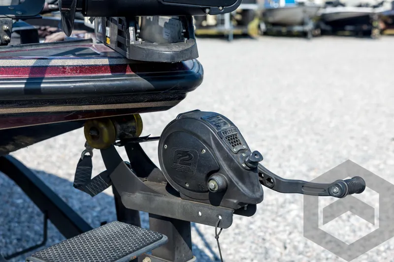 Slide: The Image of 2020 Nitro Z21 boat trailer winch with handle on gravel surface. - 11