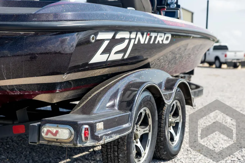 Slide: The Image of 2020 Nitro Z21 boat on trailer, showcasing sleek design and branding. - 17