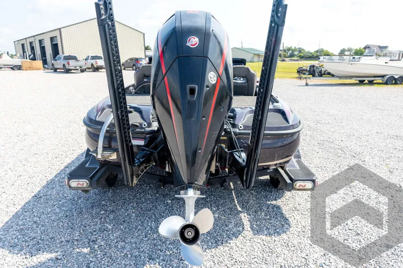 Slide: The Image of Rear view of a 2020 Nitro Z21 boat with powerful outboard motor. - 22