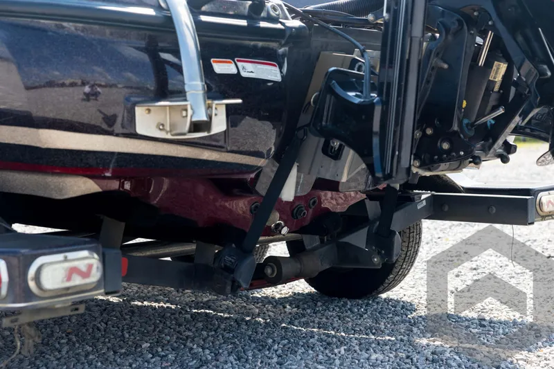 Slide: The Image of 2020 Nitro Z21 boat trailer hitch and undercarriage on gravel surface. - 29