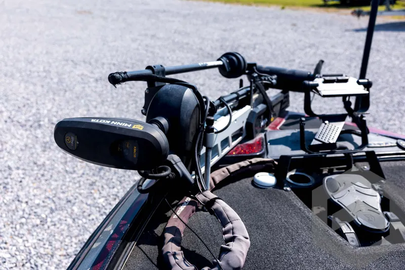 Slide: The Image of 2020 Nitro Z21 boat with Minn Kota trolling motor on gravel surface. - 35