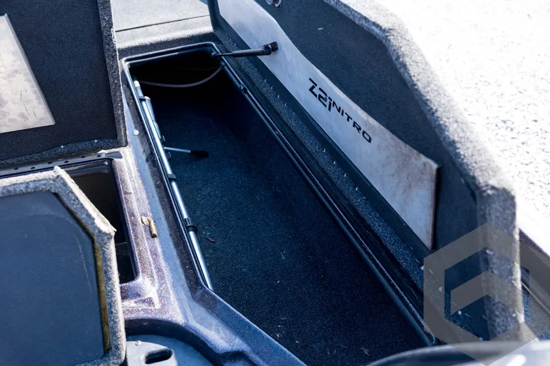 Slide: The Image of Open storage compartment of 2020 Nitro Z21 boat, showcasing interior space. - 41