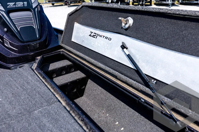 Slide: The Image of 2020 Nitro Z21 boat storage compartment with hydraulic lift and logo. - 45