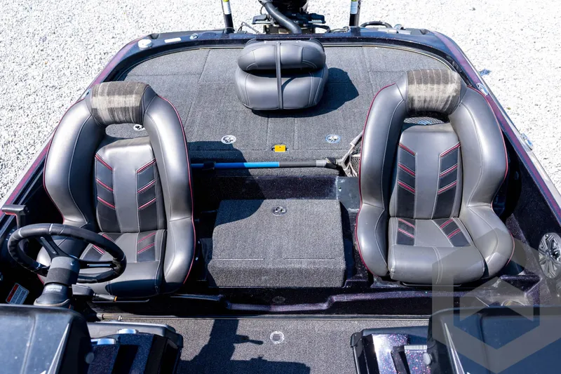 Slide: The Image of 2020 Nitro Z21 boat interior with dual black leather seats and steering wheel. - 49