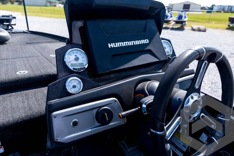 Slide: The Image of 2020 Nitro Z21 boat dashboard with Humminbird display and steering wheel. - 54