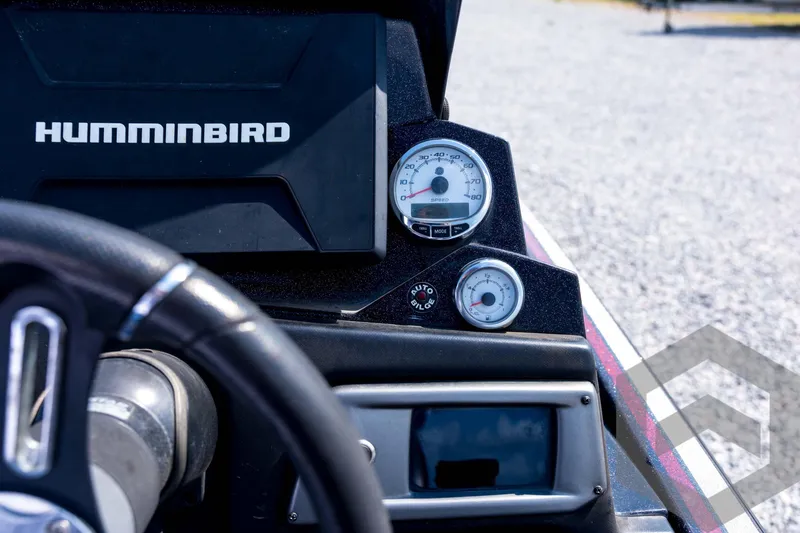 Slide: The Image of Dashboard of a 2020 Nitro Z21 boat featuring Humminbird electronics and gauges. - 55