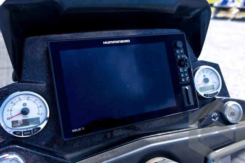 Slide: The Image of Dashboard of a 2020 Nitro Z21 boat featuring a Humminbird Solix 12 display. - 56